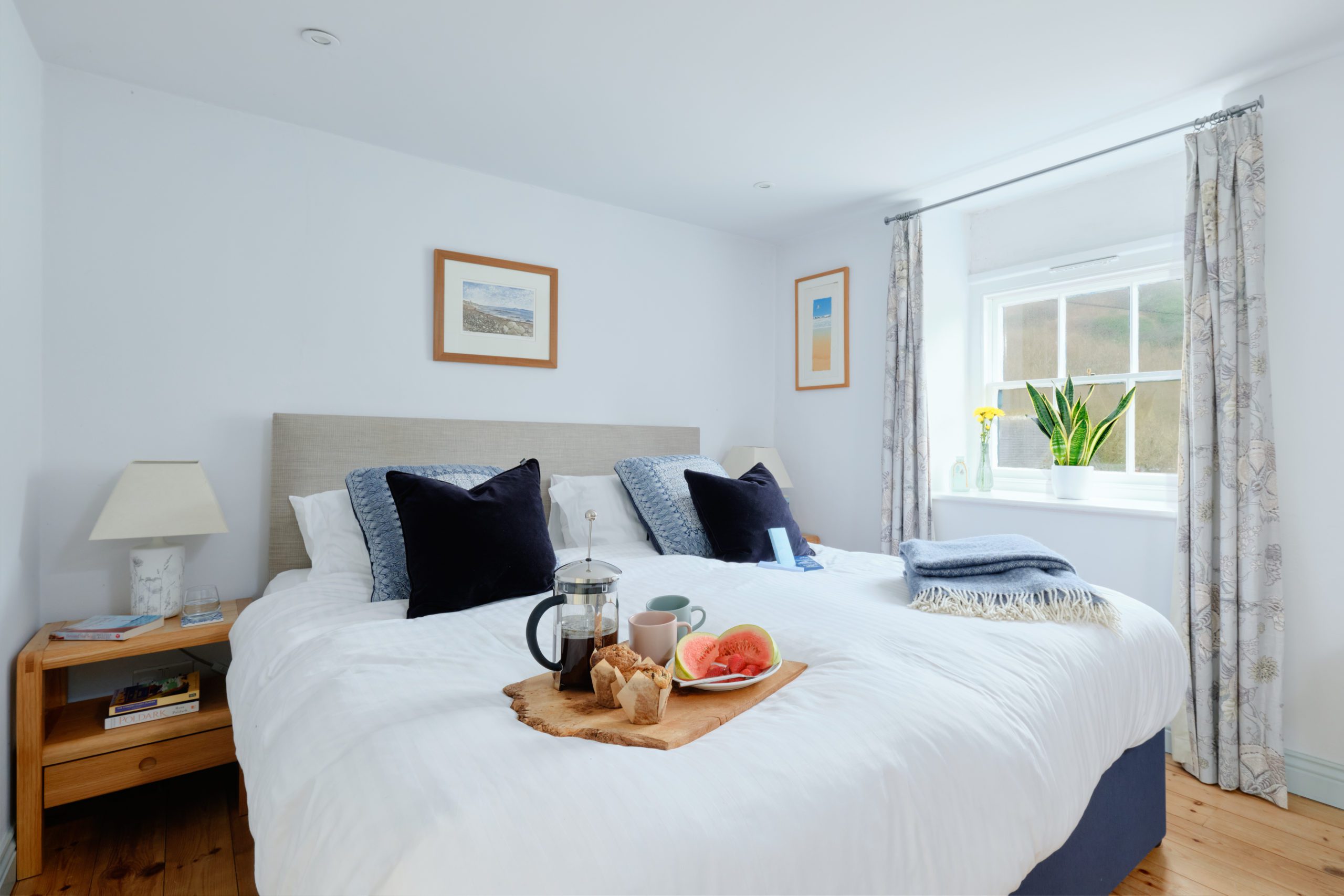 Photo of cosy bedroom with breakfast tray